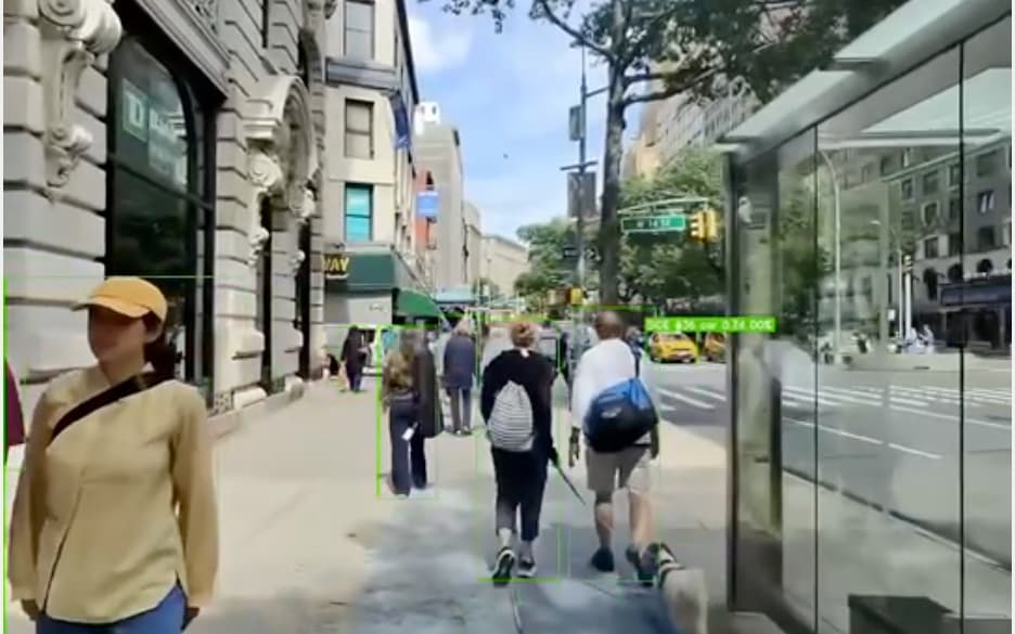 Vixa tracking people and cars on a city sidewalk